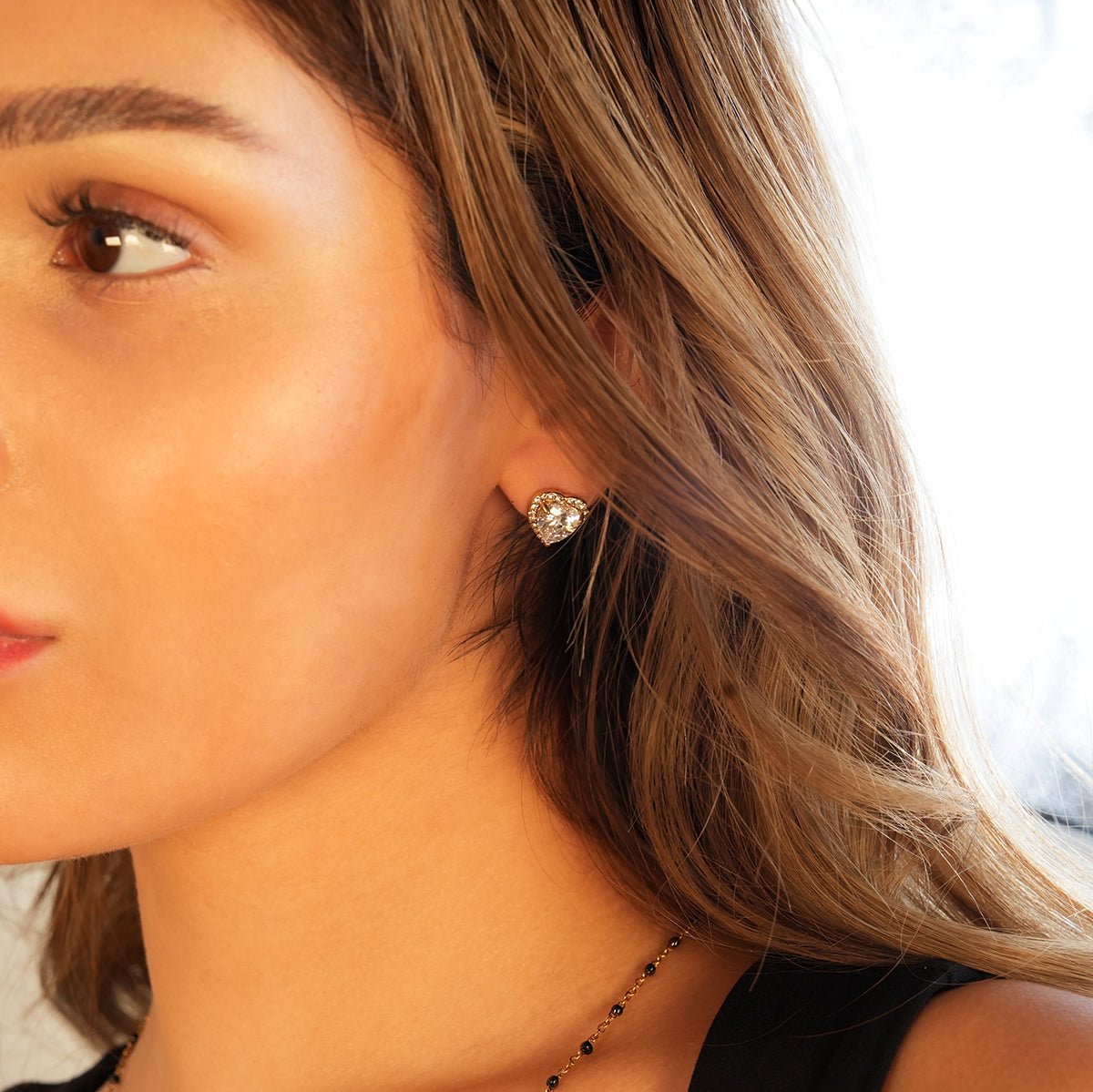 BANRAK Gold: Shimmering Heart Shaped Moissanite & Zirconia (CZ) Embedded Stud Earrings - MacroPanora