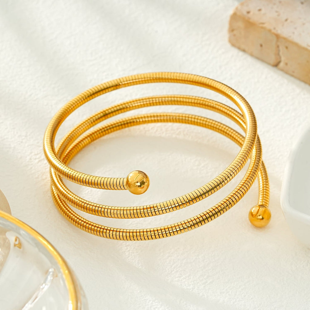 BASHEE: Triple Stacked Gold Bracelet with Surface Lines & Ball Bead Accents. - MacroPanora