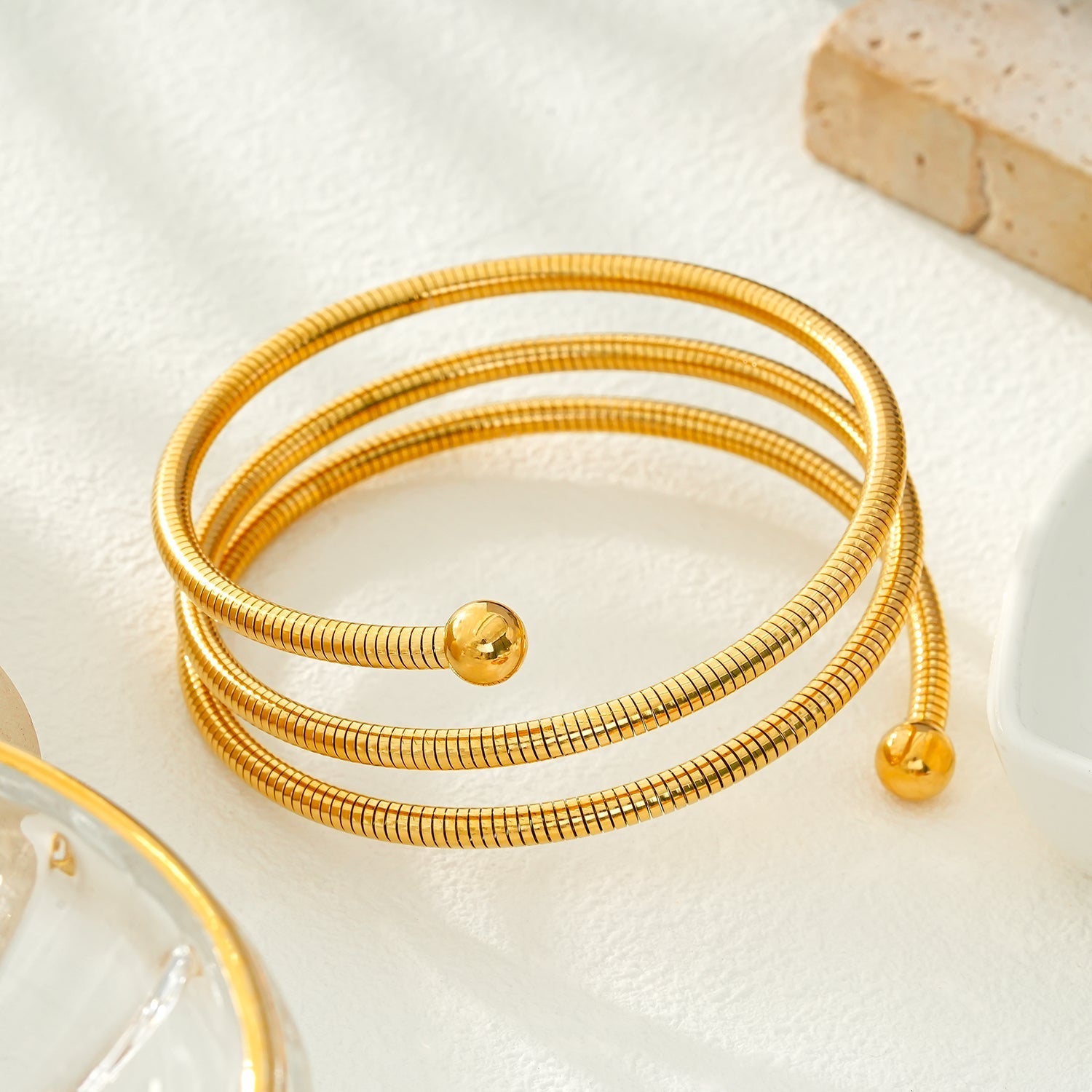 BASHEE: Triple Stacked Gold Bracelet with Surface Lines & Ball Bead Accents. - MacroPanora