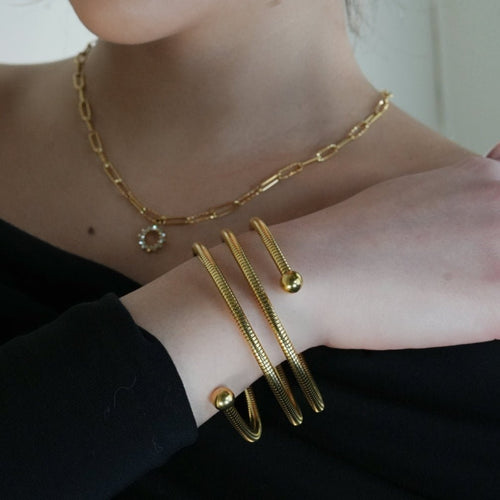 BASHEE: Triple Stacked Gold Bracelet with Surface Lines & Ball Bead Accents. - MacroPanora