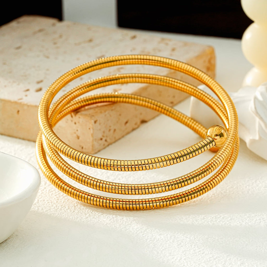 BASHEE: Triple Stacked Gold Bracelet with Surface Lines & Ball Bead Accents. - MacroPanora