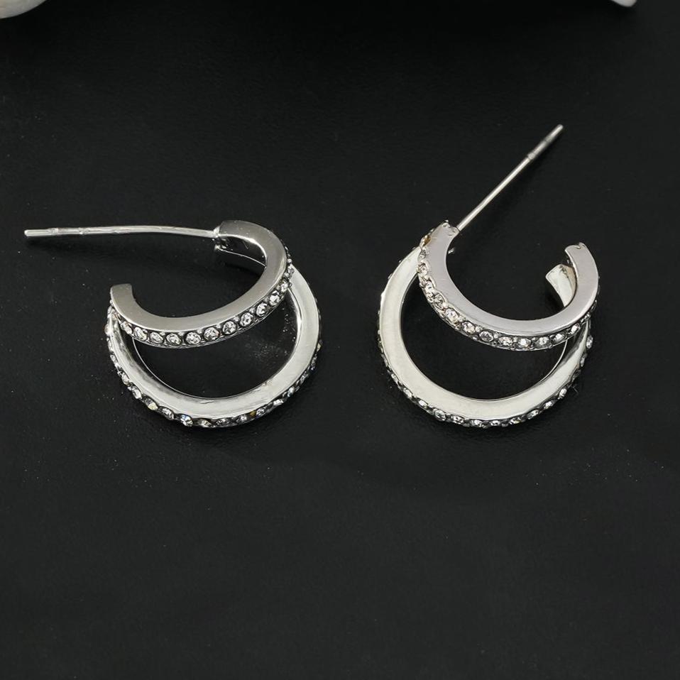 BOTTEGA: Double Banded Pavé Zirconia (CZ) Gemstones Embedded Hoop Earrings in Silver - MacroPanora