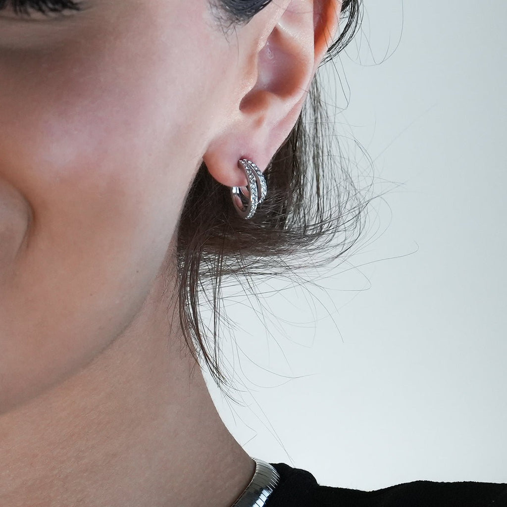 BOTTEGA: Double Banded Pavé Zirconia (CZ) Gemstones Embedded Hoop Earrings in Silver - MacroPanora