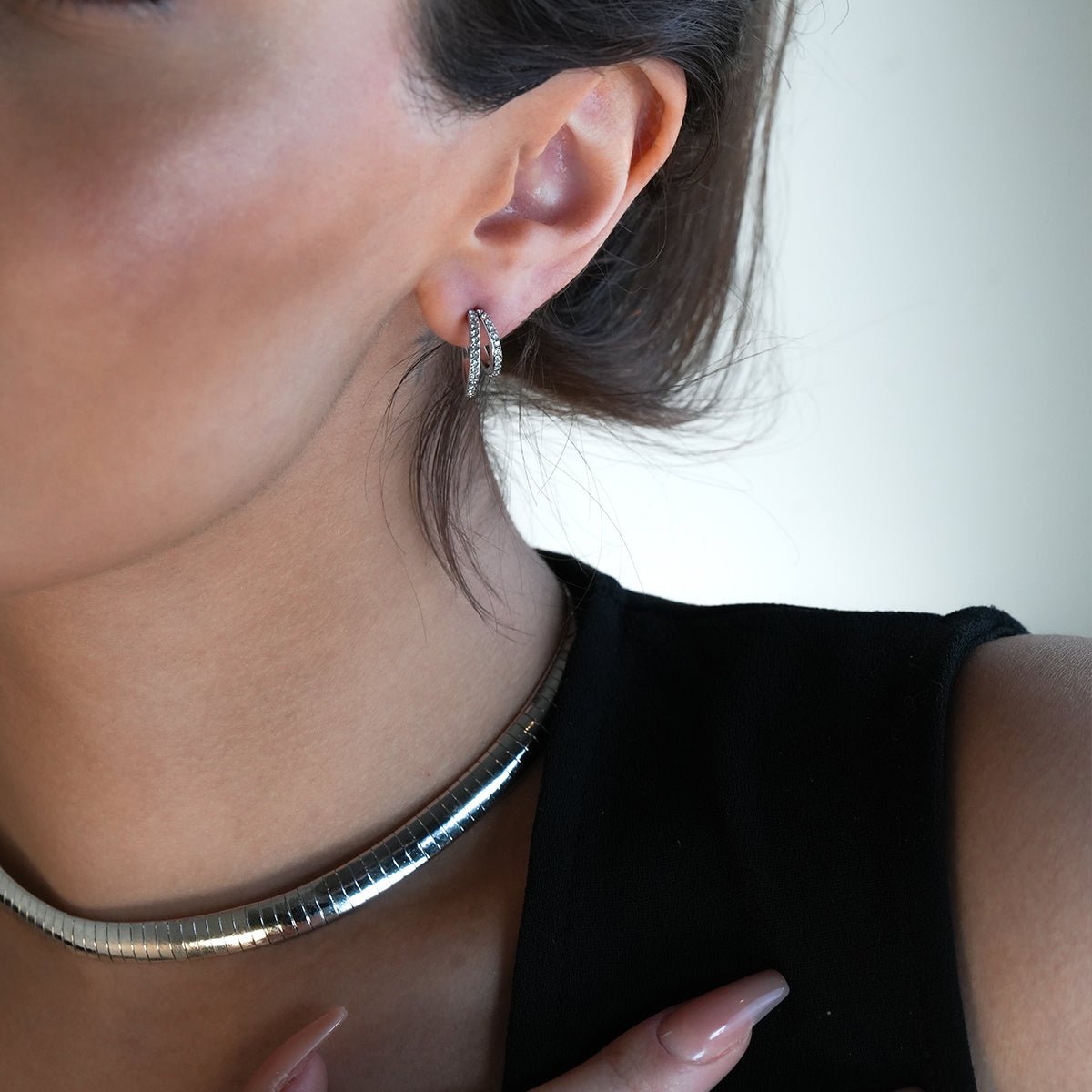 BOTTEGA: Double Banded Pavé Zirconia (CZ) Gemstones Embedded Hoop Earrings in Silver - MacroPanora