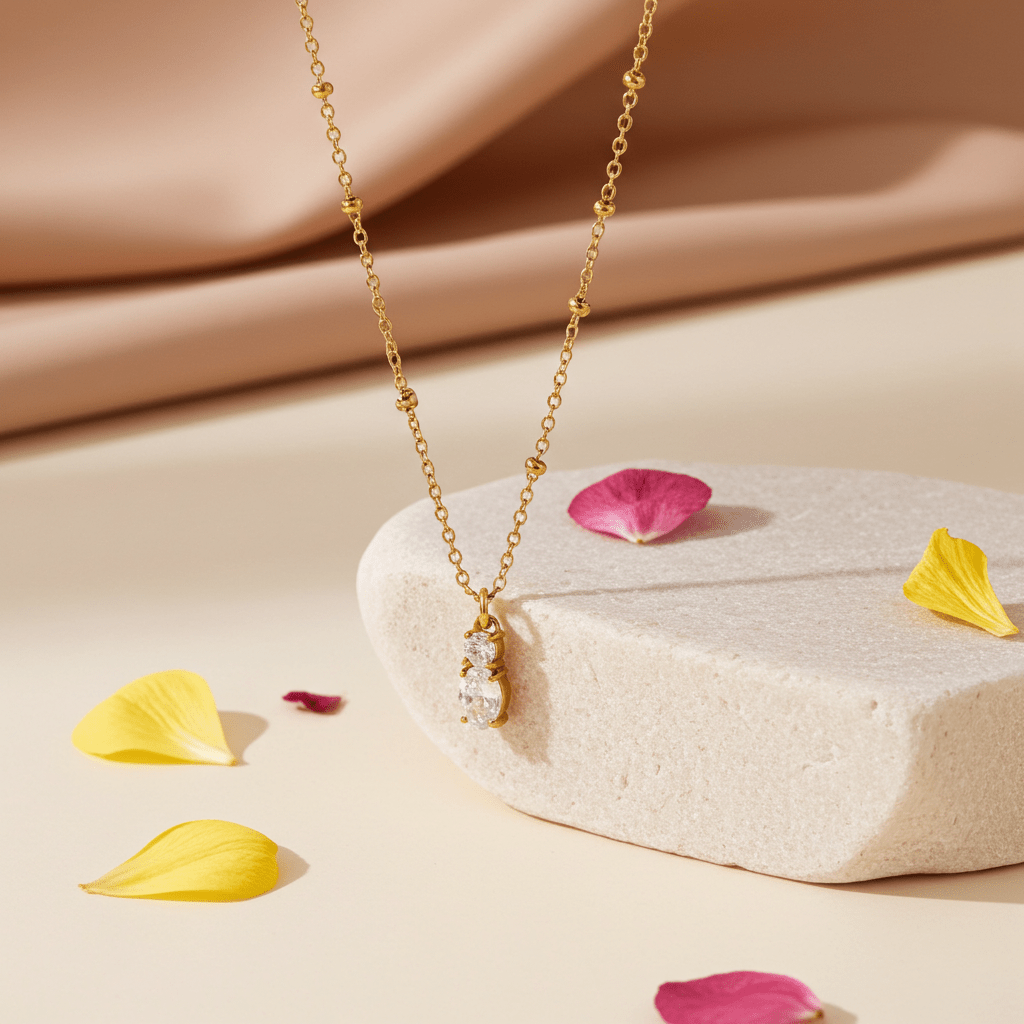 CABBANA Gold: A Duo Set of Zirconia Charm Pendants on a Beaded Chain Necklace - MacroPanora