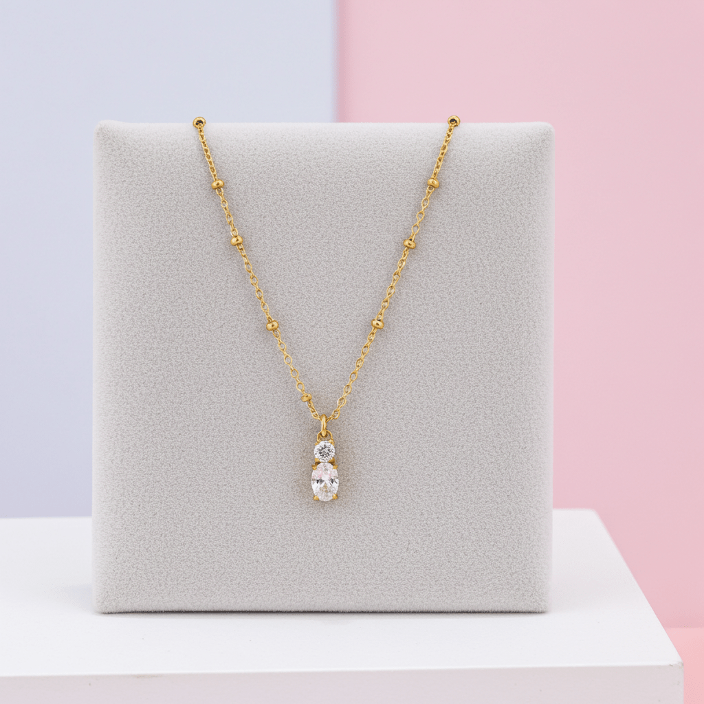 CABBANA Gold: A Duo Set of Zirconia Charm Pendants on a Beaded Chain Necklace - MacroPanora