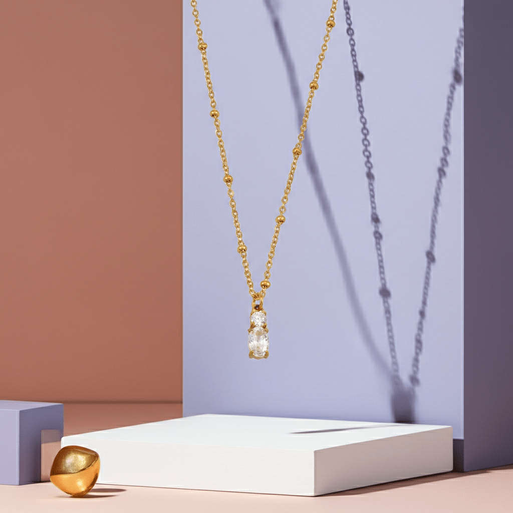 CABBANA Gold: A Duo Set of Zirconia Charm Pendants on a Beaded Chain Necklace - MacroPanora