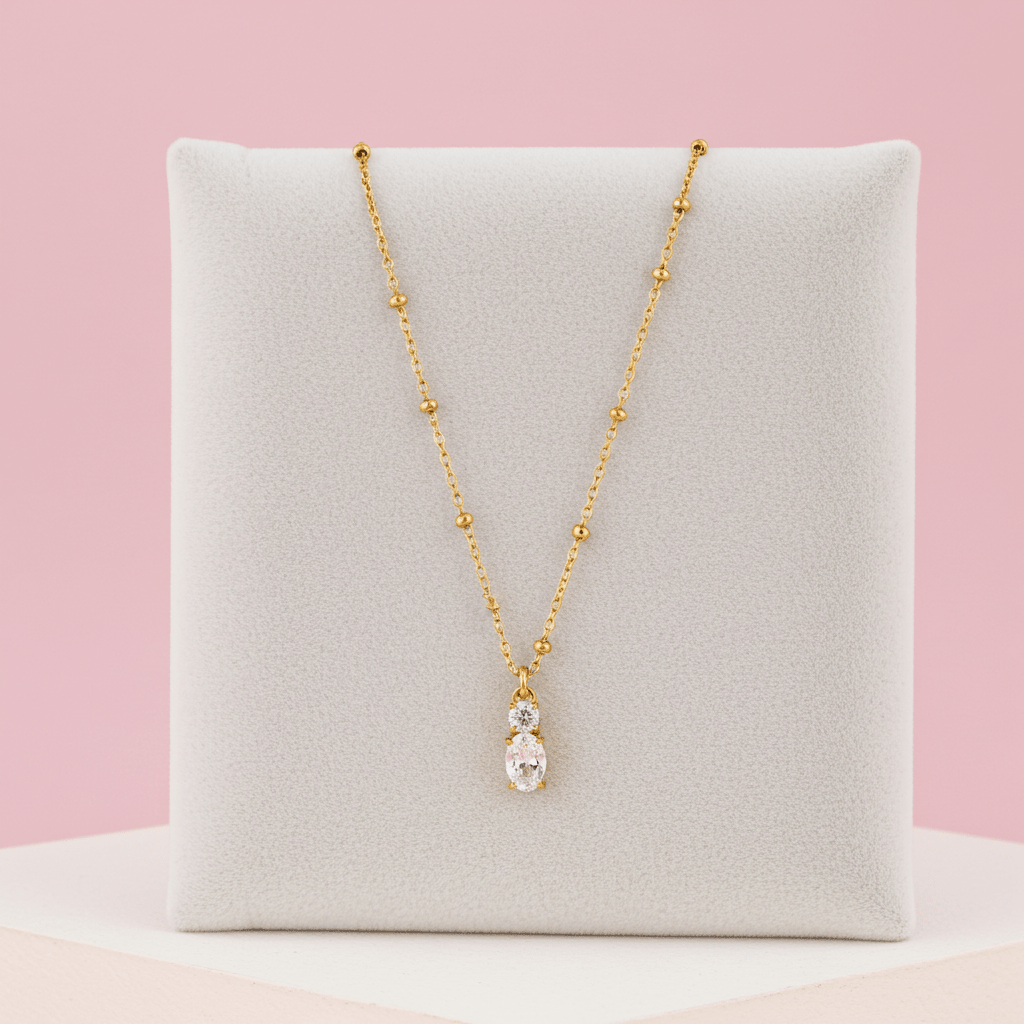 CABBANA Gold: A Duo Set of Zirconia Charm Pendants on a Beaded Chain Necklace - MacroPanora