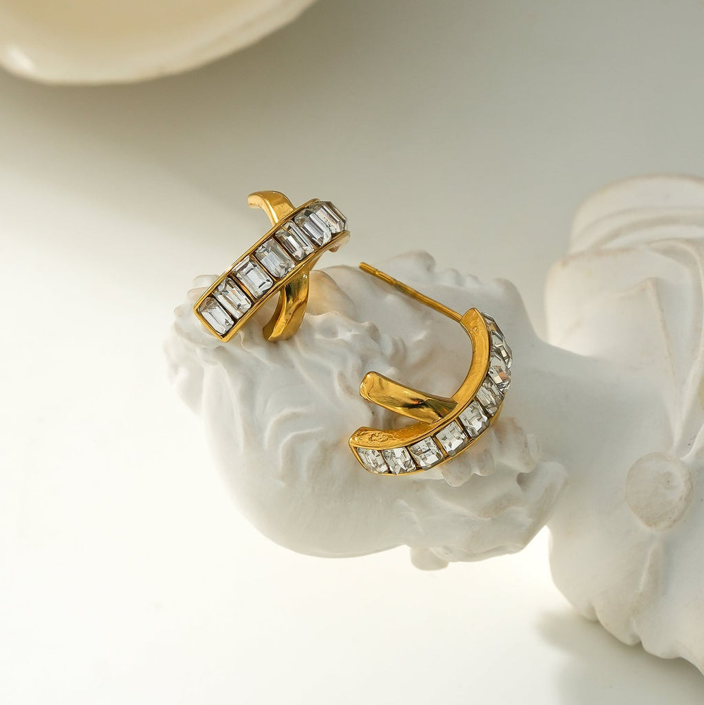 CARBIS: Retro Style Crossover Zirconia Embedded Earrings in Gold - MacroPanora