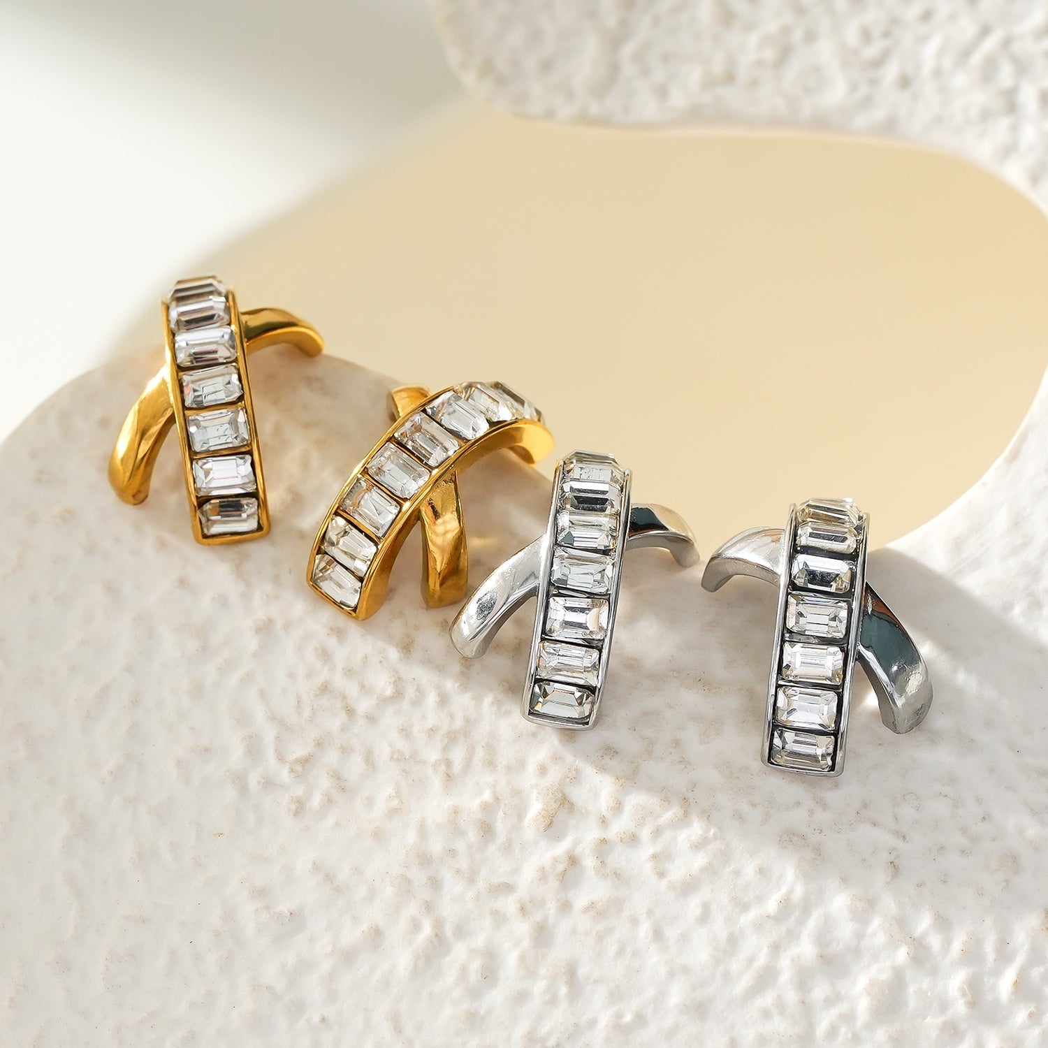 CARBIS: Retro Style Crossover Zirconia Embedded Earrings in Gold - MacroPanora