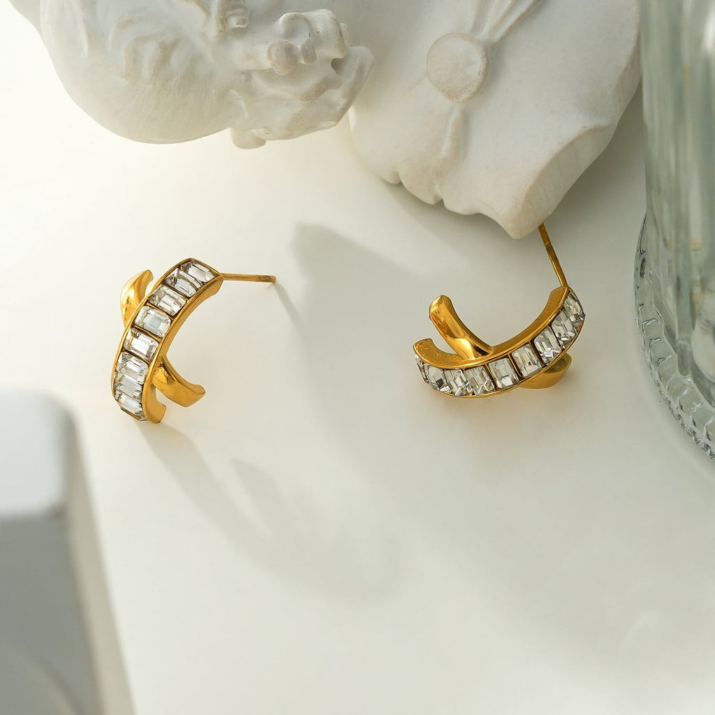 CARBIS: Retro Style Crossover Zirconia Embedded Earrings in Gold - MacroPanora