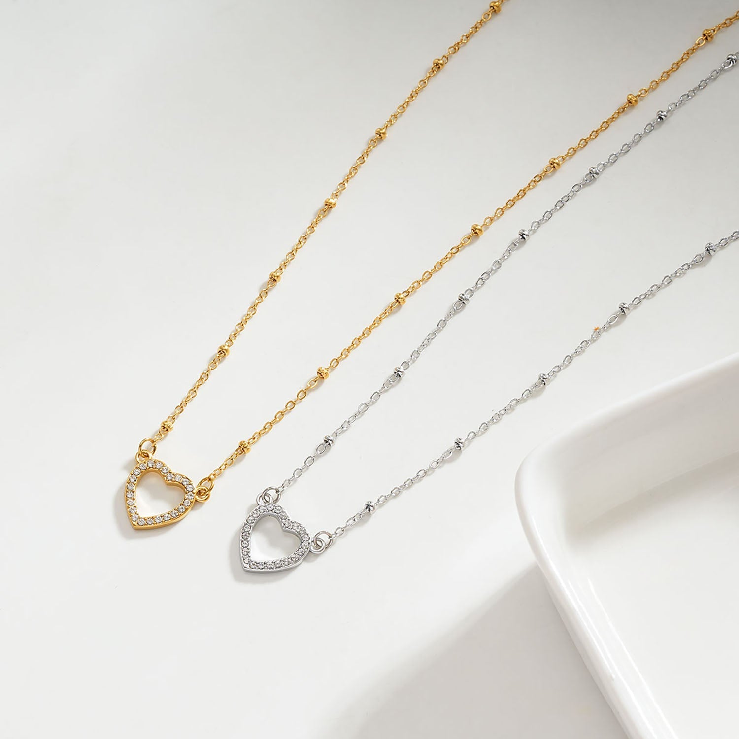 CHERISH Silver (White Gold): Beaded Chain Anchoring an Elegant Pavé Heart Charm Pendant - MacroPanora