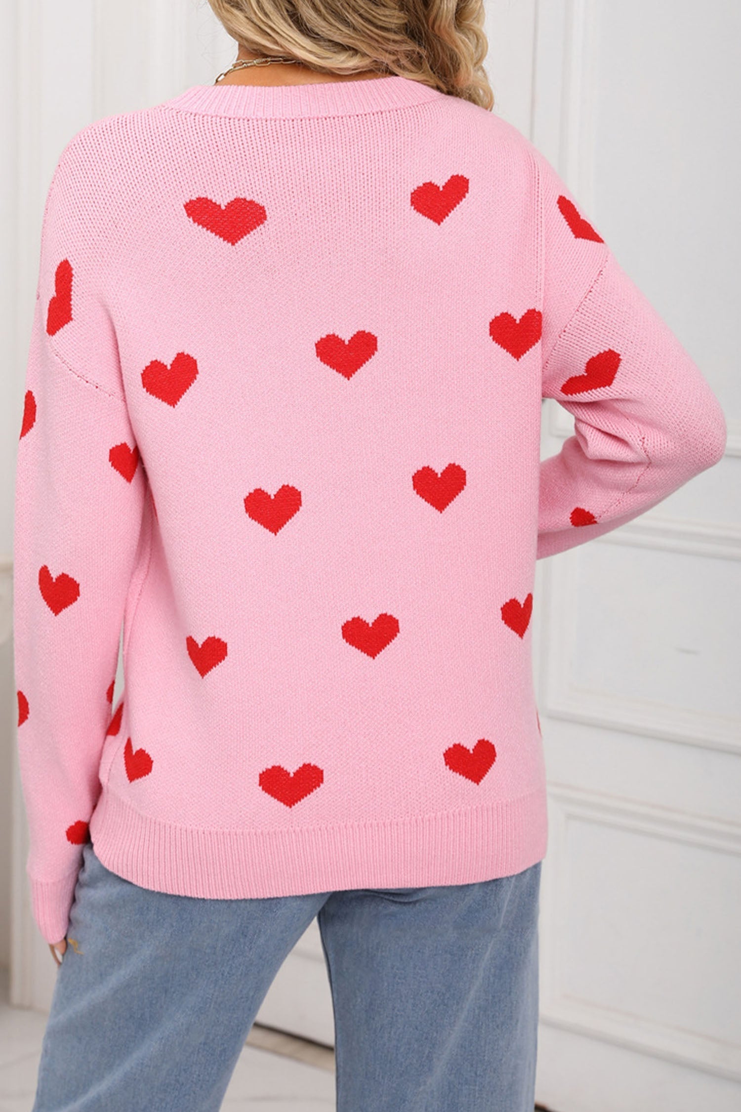 Cozy Women's Pink Heart Print Sweater with Drop Shoulders and Classic Round Neck for Casual Everyday Style - MacroPanora
