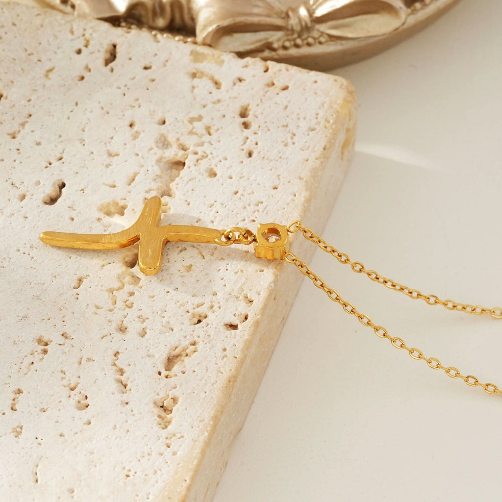 CRISTO Gold: Dainty Chain Necklace with a Zirconia Embedded Abstract Textured Cross Pendent - MacroPanora
