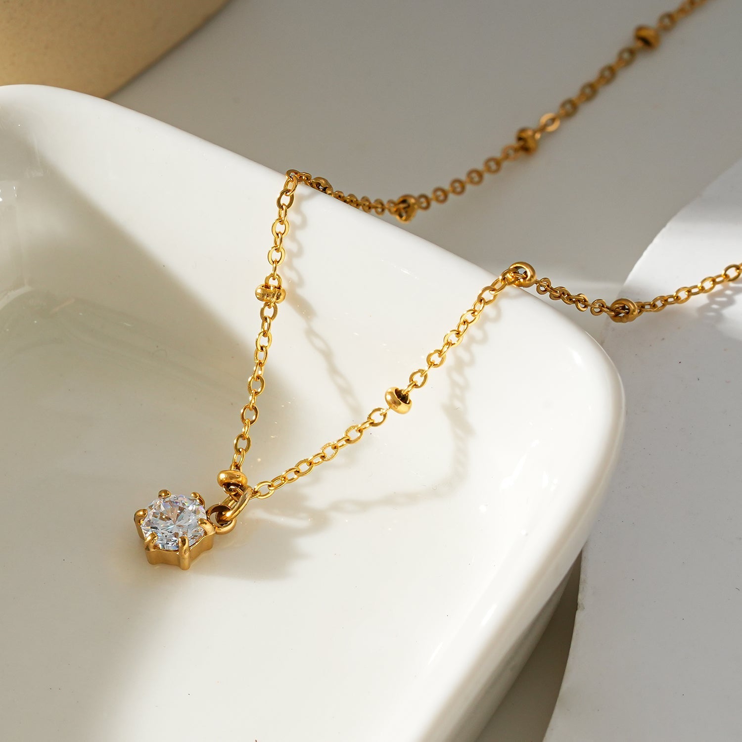KADIRI Gold: Solitaire Zirconia Charm Pendant on a Beaded Chain Necklace - MacroPanora