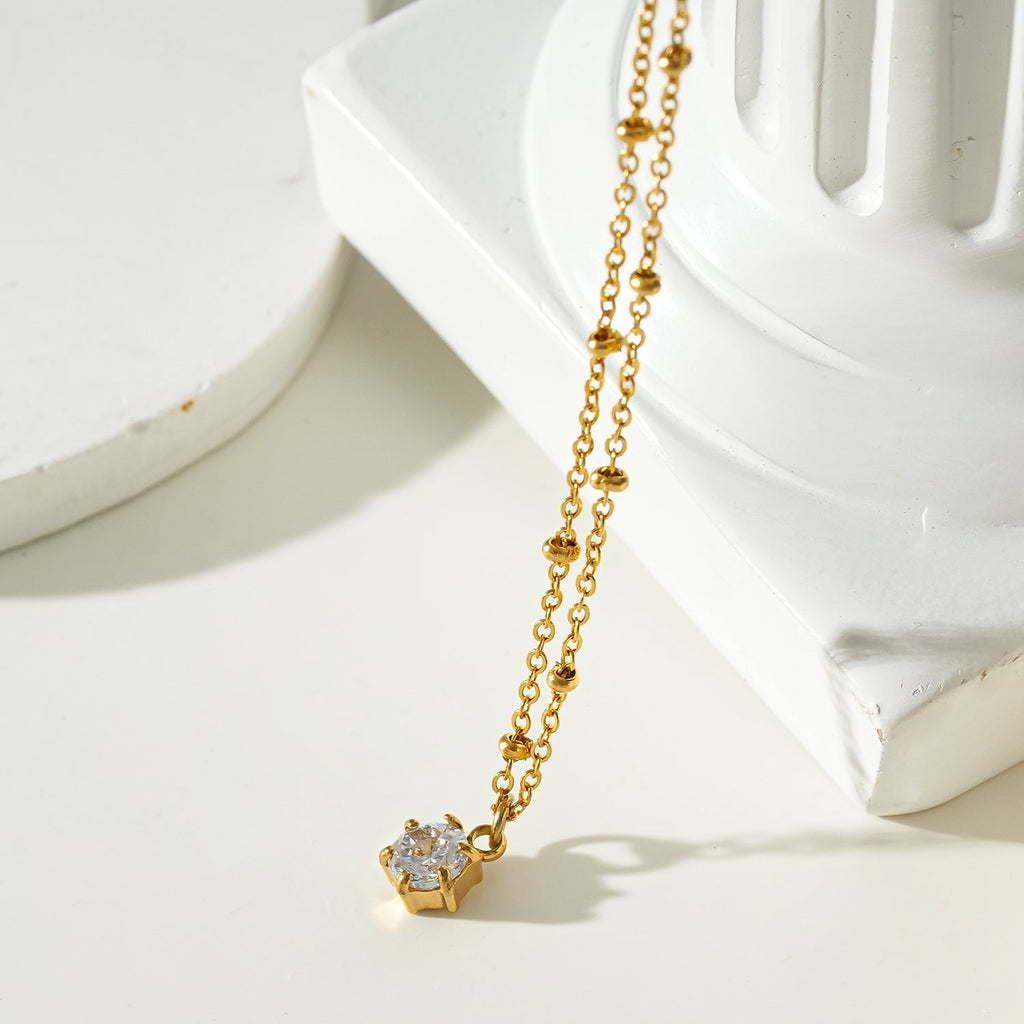 KADIRI Gold: Solitaire Zirconia Charm Pendant on a Beaded Chain Necklace - MacroPanora