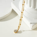 KADIRI Gold: Solitaire Zirconia Charm Pendant on a Beaded Chain Necklace - MacroPanora
