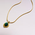 KRISTOS: Vintage Inspired Snake Skin Chain anchoring a Malachite Oval Pendant - MacroPanora