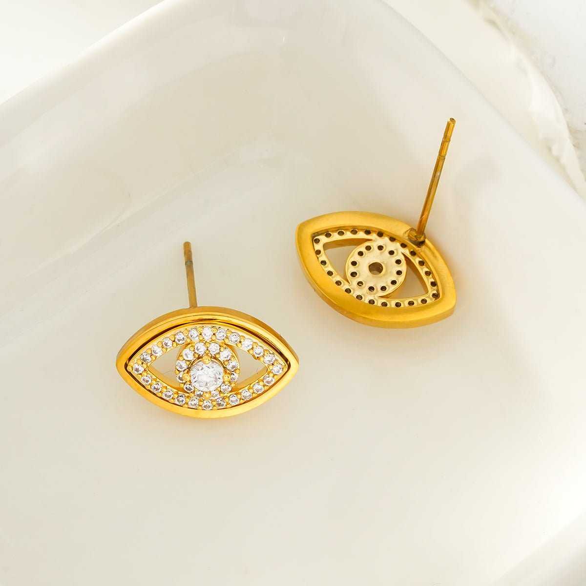 LUCKY EYE Gold: Zirconia (CZ) Embellished Evil Eye Stud Earrings - MacroPanora