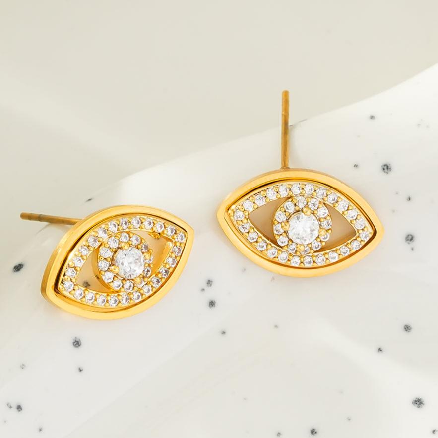 LUCKY EYE Gold: Zirconia (CZ) Embellished Evil Eye Stud Earrings - MacroPanora