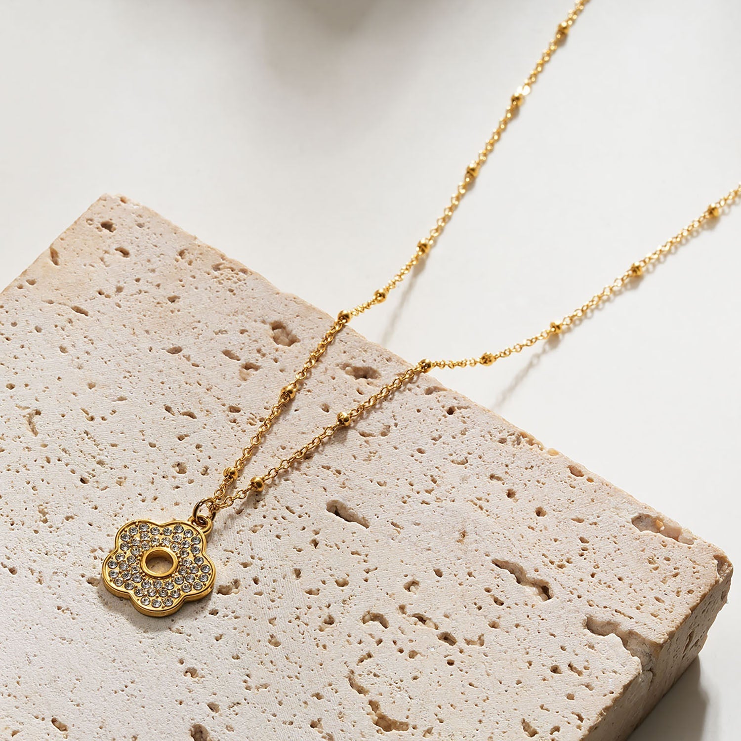 MELRINA Gold - Vintage Bloom: Beaded Chain Necklace with Pave Zirconia Flower Charm - MacroPanora