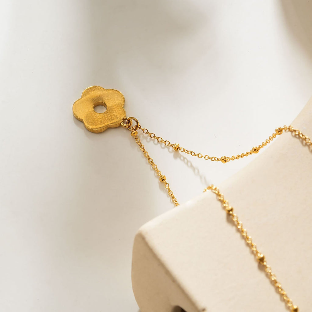 MELRINA Gold - Vintage Bloom: Beaded Chain Necklace with Pave Zirconia Flower Charm - MacroPanora