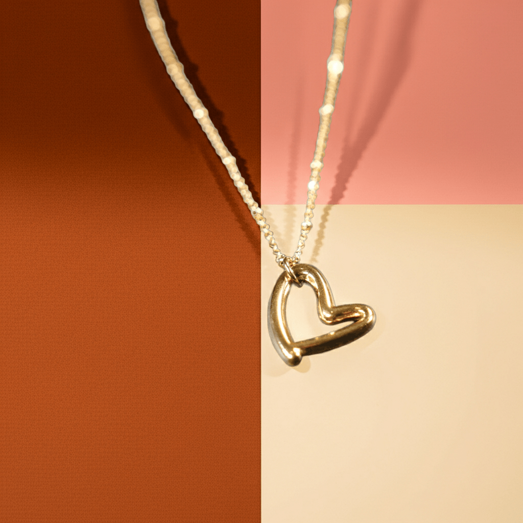 SMITTEN Gold: Dainty Beaded Chain Anchoring an Abstract Heart Shaped Pendant - MacroPanora