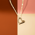 SMITTEN Gold: Dainty Beaded Chain Anchoring an Abstract Heart Shaped Pendant - MacroPanora