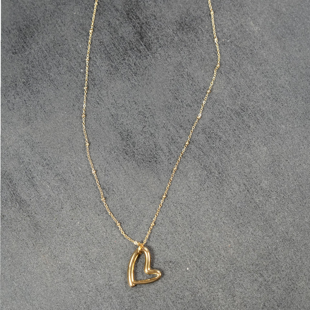 SMITTEN Gold: Dainty Beaded Chain Anchoring an Abstract Heart Shaped Pendant - MacroPanora