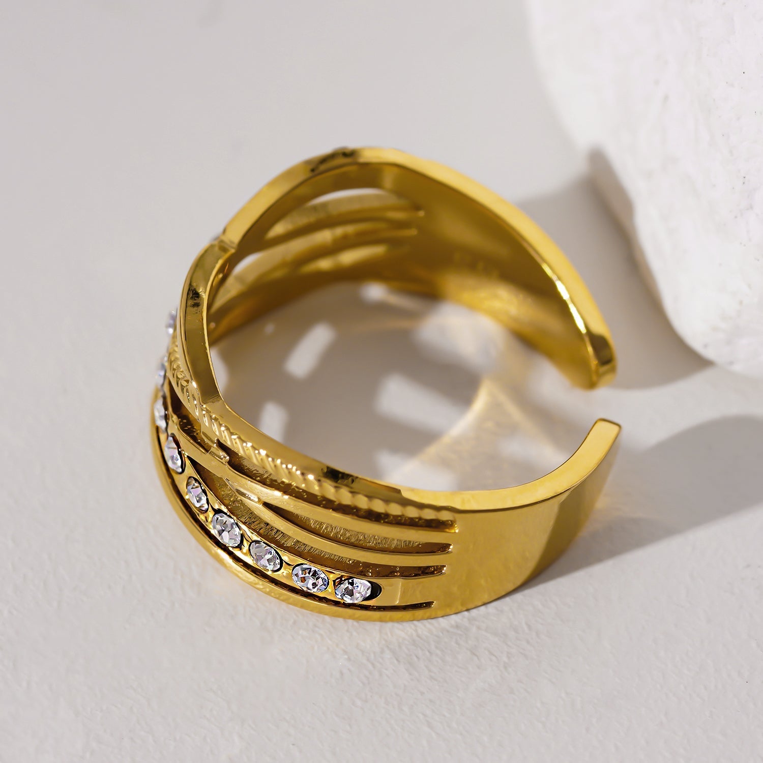 Style CORAZON: Cross Over Multi Stacked Zirconia Embedded Ring - MacroPanora