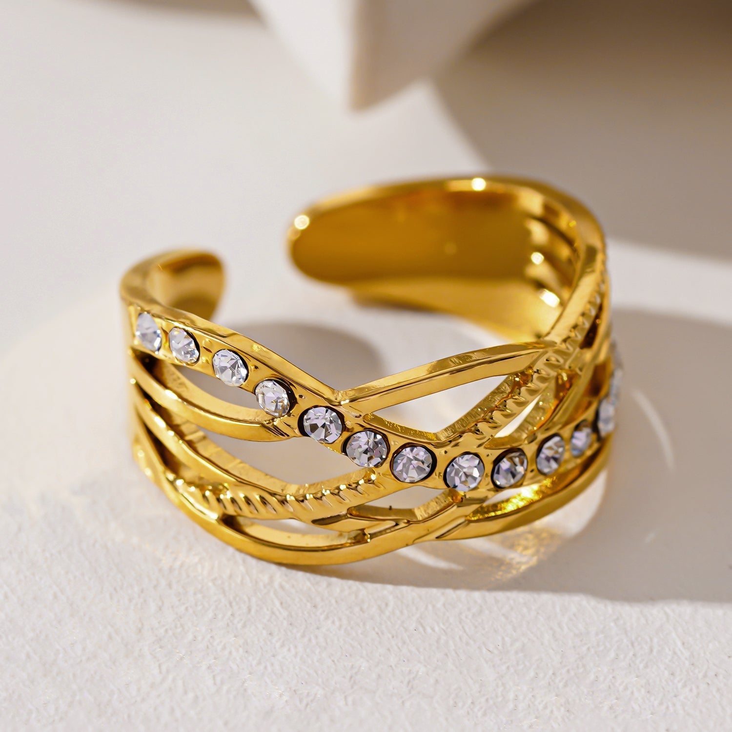 Style CORAZON: Cross Over Multi Stacked Zirconia Embedded Ring - MacroPanora