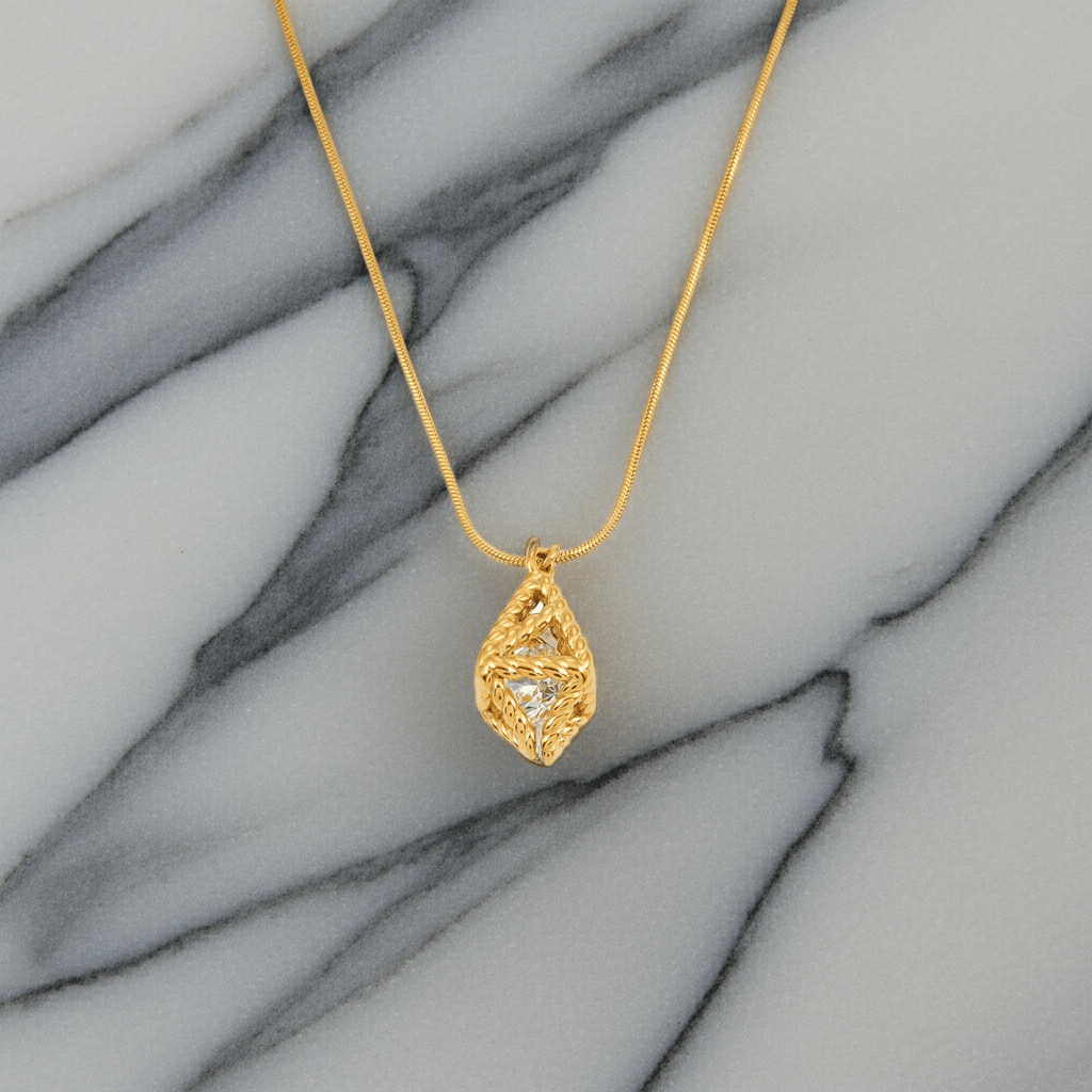 Style KARJAT: Gold Chain Necklace with Geometric Caged Zirconia Pendant - MacroPanora