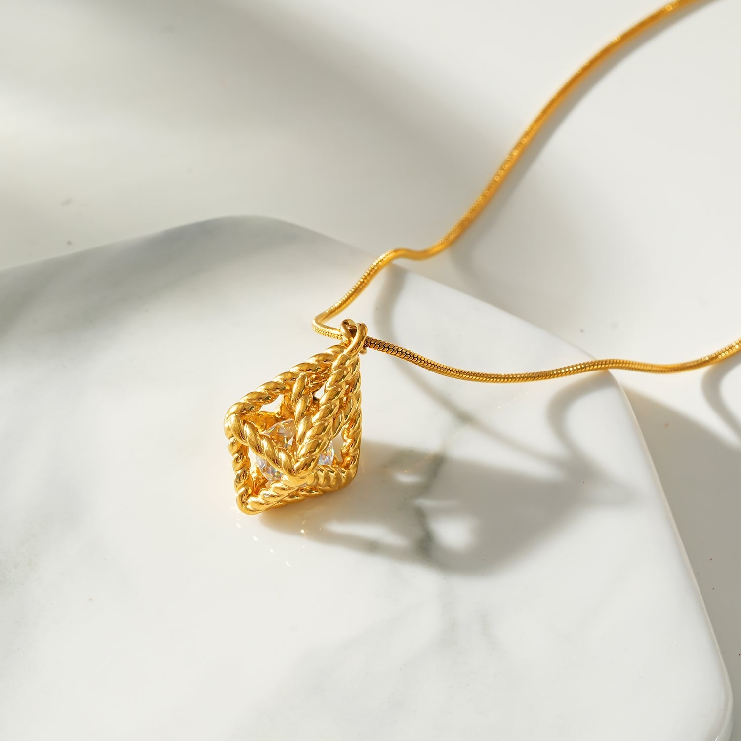 Style KARJAT: Gold Chain Necklace with Geometric Caged Zirconia Pendant - MacroPanora