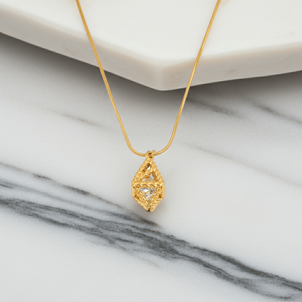 Style KARJAT: Gold Chain Necklace with Geometric Caged Zirconia Pendant - MacroPanora