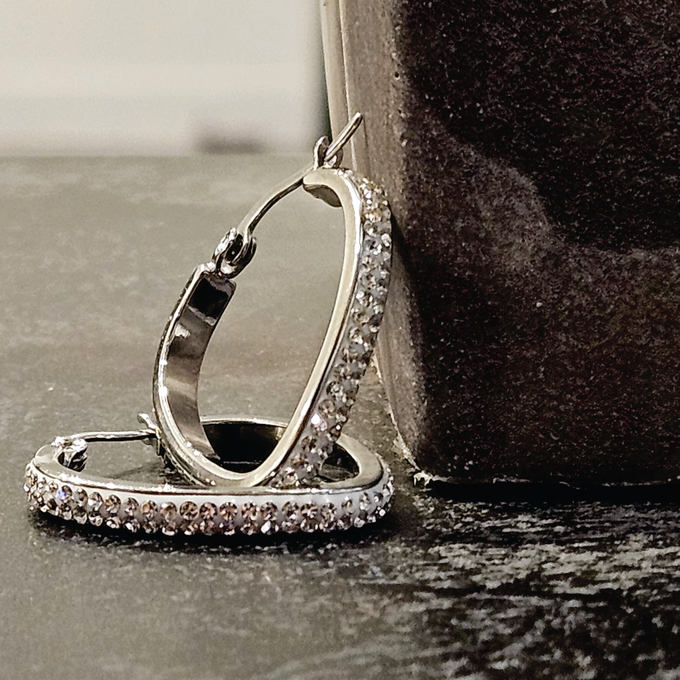 Style MELFI Silver: Abstract Heart Shaped Hoops embedded with Zirconia Gemstones - MacroPanora