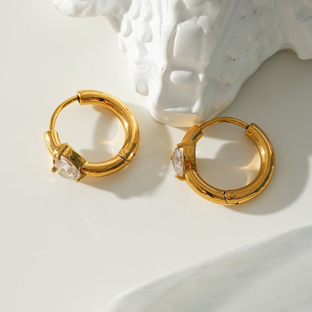 Style PELLA Gold: Mini Hoop Gold Earrings with Heart Shaped Moissanite - MacroPanora