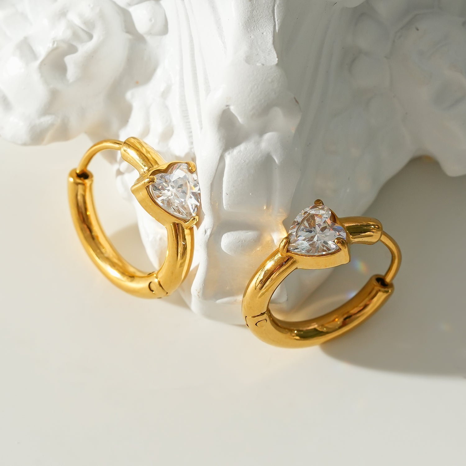 Style PELLA Gold: Mini Hoop Gold Earrings with Heart Shaped Moissanite - MacroPanora
