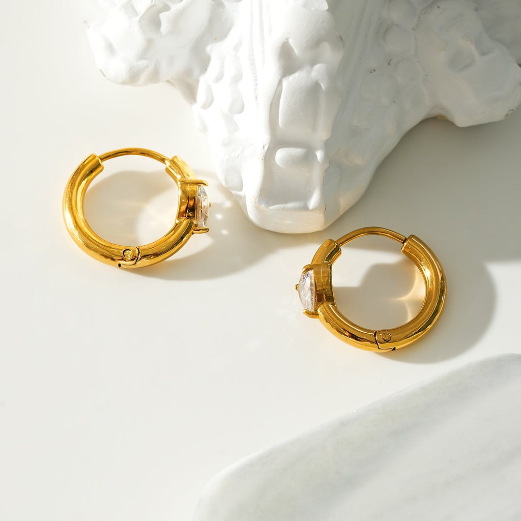 Style PELLA Gold: Mini Hoop Gold Earrings with Heart Shaped Moissanite - MacroPanora