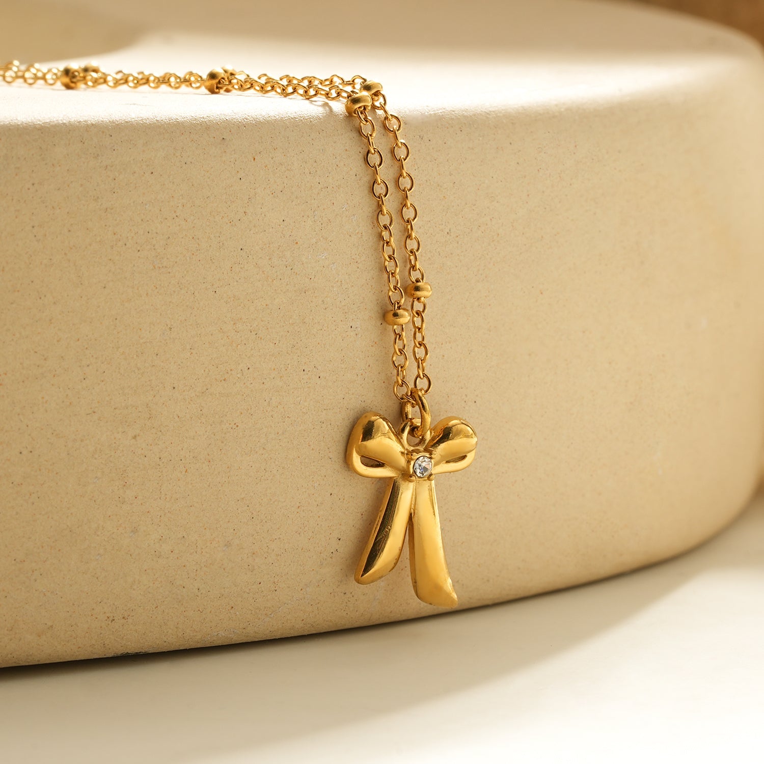 TALIANA Gold: Dainty Beaded Chain Necklace with Bow Pendant & Solitaire Zirconia – Elegant Everyday Jewelry - MacroPanora