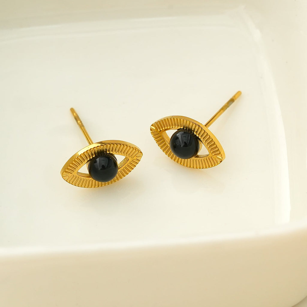 TAVIRA: Gold Evil Eye Studs with Black Onyx Embellishment - MacroPanora