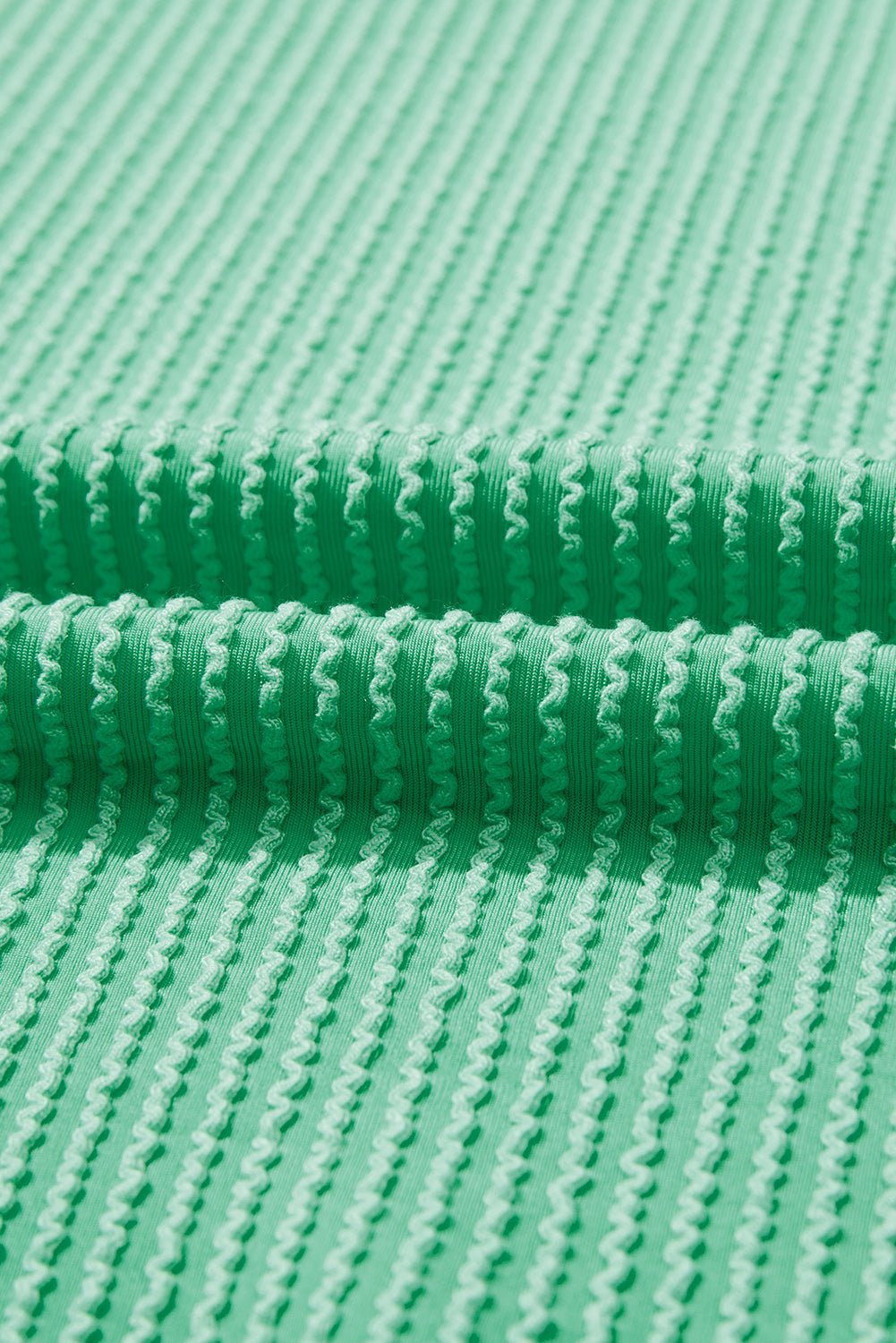 Women's Bright Green Loose Knit Top - Twisted Rib Design, Drop Shoulder, and Asymmetrical Hem for a Trendy Look - MacroPanora