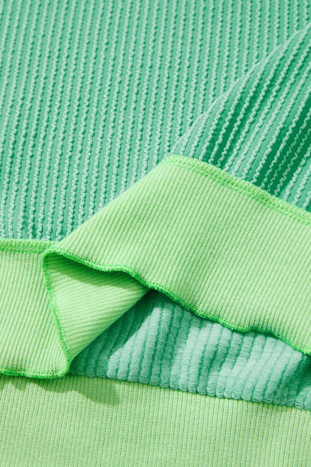 Women's Bright Green Loose Knit Top - Twisted Rib Design, Drop Shoulder, and Asymmetrical Hem for a Trendy Look - MacroPanora